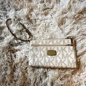 Michael Kors authentic wristlet in vanilla